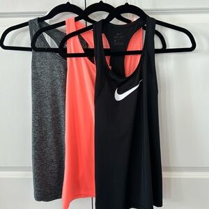 Like New Package of Three Exercise Tank Tops